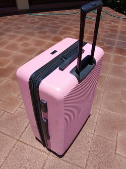 Large pink suitcase