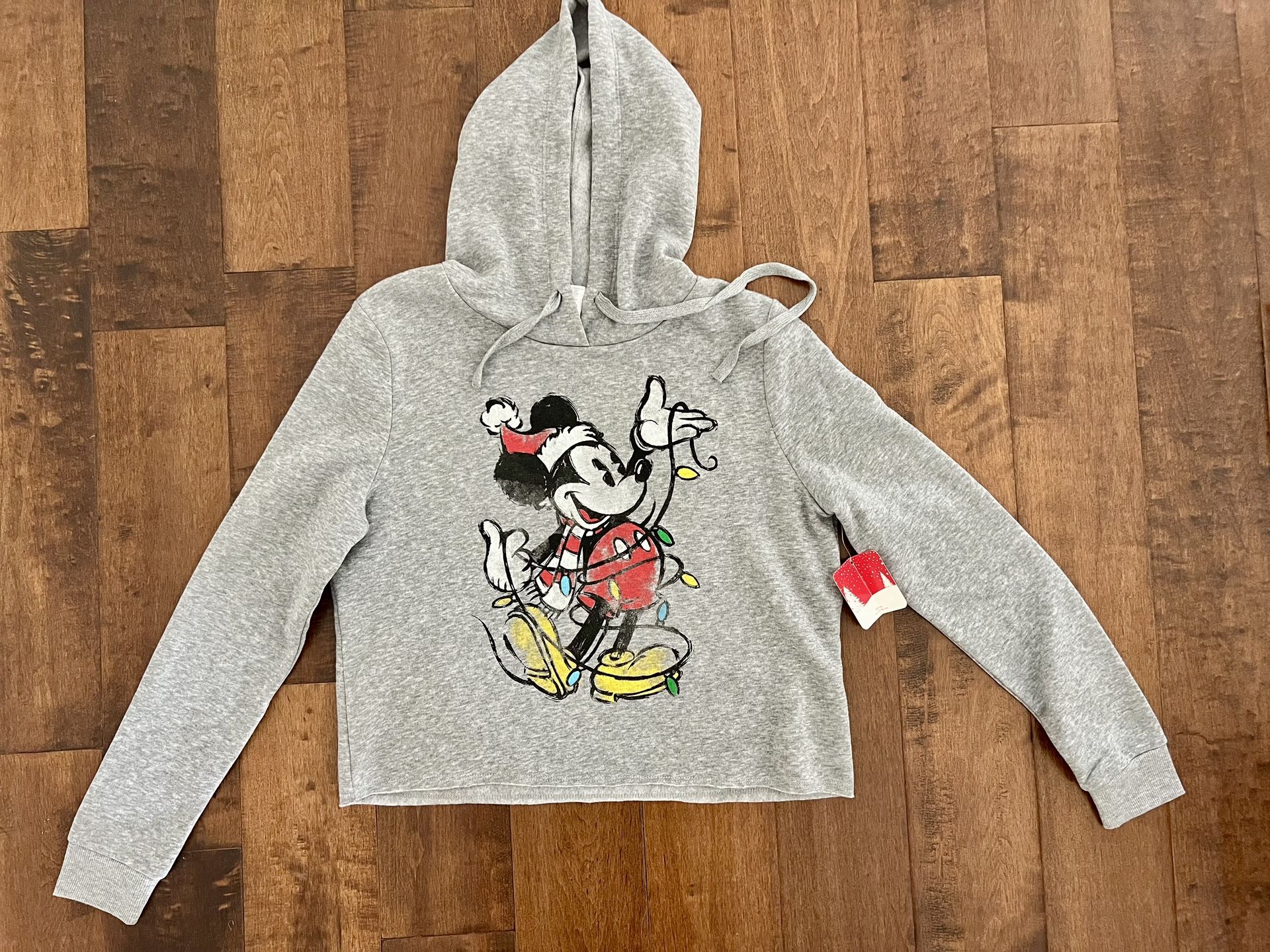 NWT Disney Christmas Mickey Mouse cropped sweatshirt sweater hoodie Medium New with tags Size Medium Cropped hoodie with soft fleece lining.