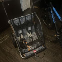 Trek bike and child two seater bike trailer/stroller