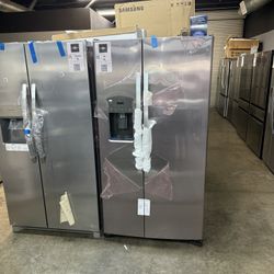 GE - Side By Side Refrigerator In Stainless Steel
