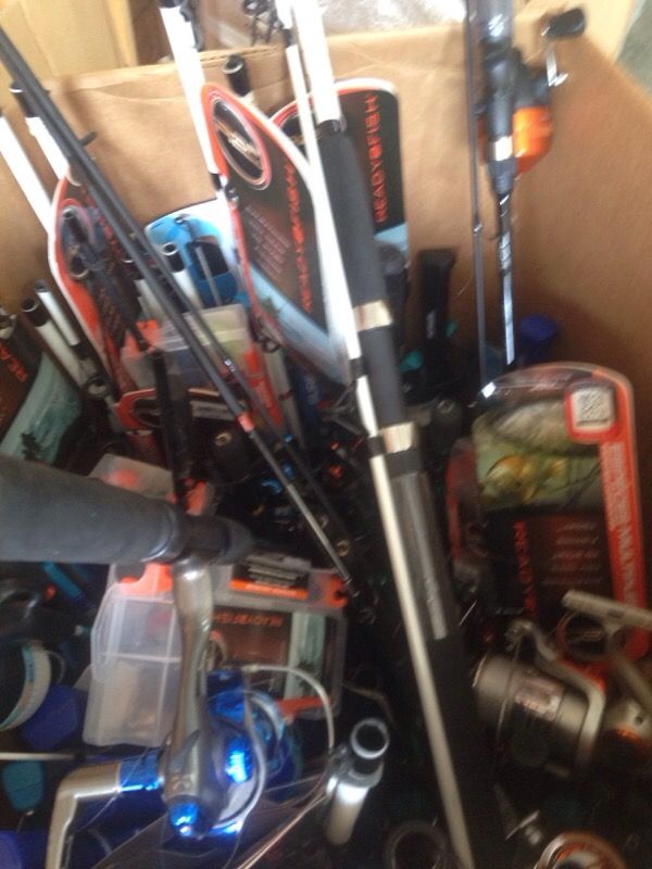 Full pallet of fishing rods and reels plus more