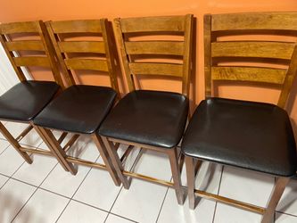 4 luxury dining chairs like new