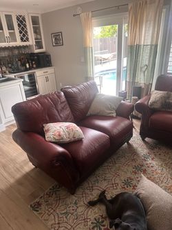 Burgundy Leather Sofa and Loveseat with Nailhead Trim