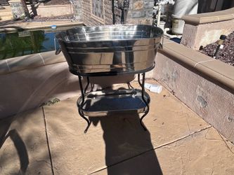 Silver ice bucket with stand for beverages