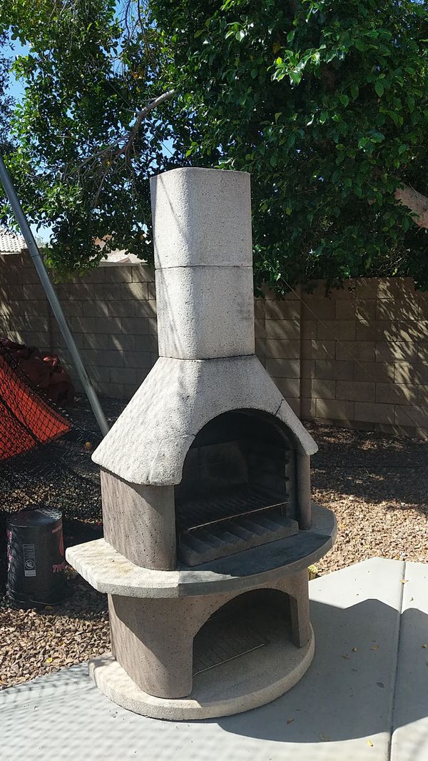Concrete fireplace very sturdy and heavy. Has two minor cracks, but