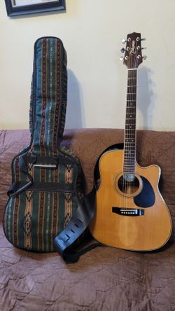 TAKAMINE G-SERIES ACOUSTIC ELECTRIC GUITAR MODEL EG-334C MADE IN VIETNAM DREINAUGH IN NATURAL COLOR.