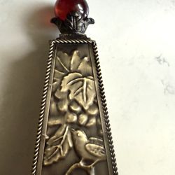 Unique Obelisk With Grape Wine Motif with Red Glass Sphere at Top - Brass Color 16” tall