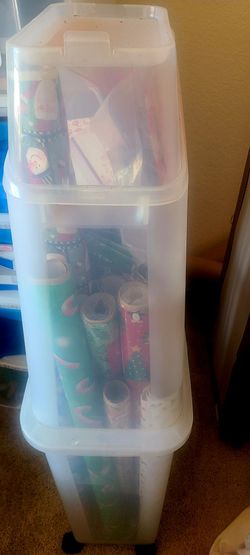Wrapping paper storage on wheels