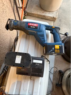 Ryobi saw with battery and charger