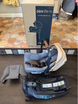 Nuna PIPA Lite RX Lightweight Infant Car Seat w/ Load Leg (Camel)