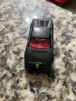 Hot wheels  “Ferrari Black / interior red “  1990