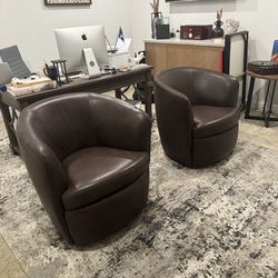 Pair of 100% leather swivel chairs