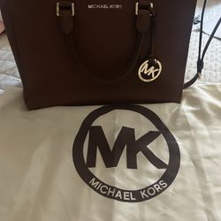 Michael Kors original purse. Well kept nice condition.