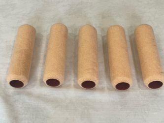 5 Paint rollers. 9”