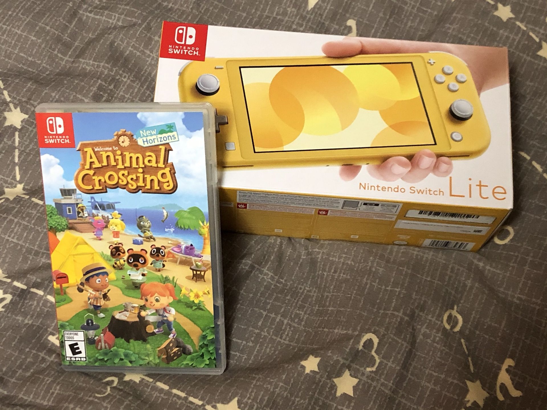 Nintendo Switch Lite Yellow and Animal Crossing New Horizons