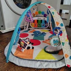  Baby Einstein 4-in-1 Kickin' Tunes Music and Language Discovery Play Gym