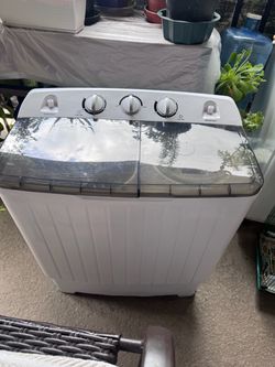 Portable washing and drying machine