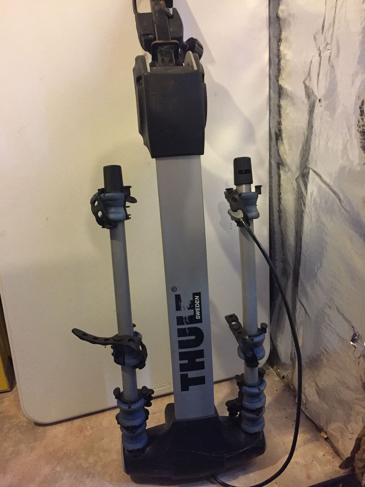 Thule Bike Rack,holds 4 bikes, theft proof lock for bike mount and bikes. All pieces included excellent condition, easily folds up and down for easy