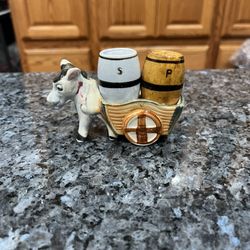 Vintage 1960’s Donkey and Cart Holding Barrels Pair of Salt and Pepper Shakers.  Size approximately 4 inches long and 2 1/2 inches tall.  Preowned wit