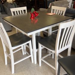 Dinette table with four stools 36 inch high table with 24 inch barstools Brand New ready to go so hurry limited quantities