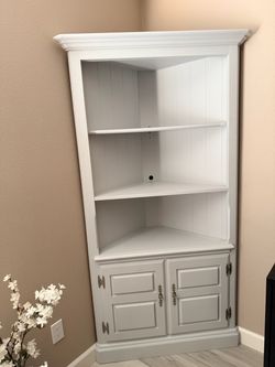 Corner shelf with cabinet