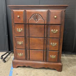 Traditional Dark Wood Dresser with Ornate Hardware