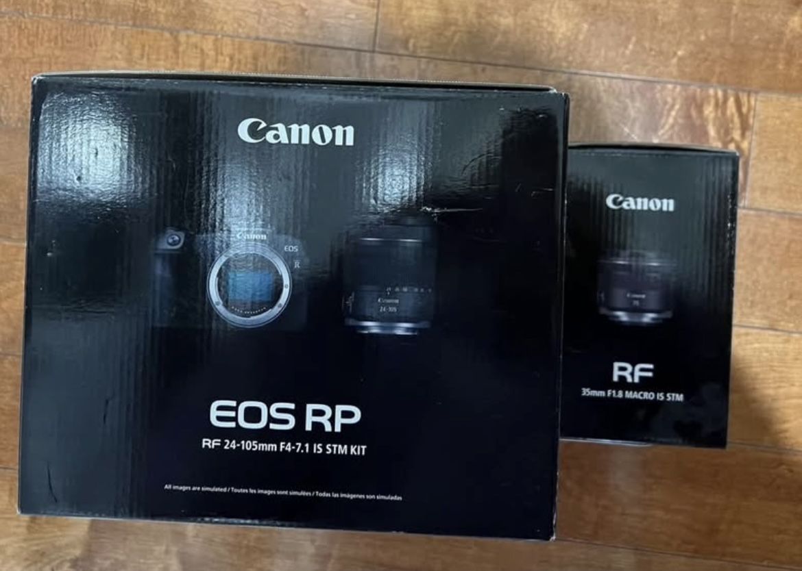 Canon EOS RP Mirrorless Camera with RF 24-105mm f/4-7.1 IS STM lens and RF 35mm F1.8 macro IS STM