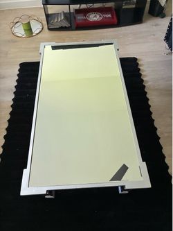 Glass coffee table