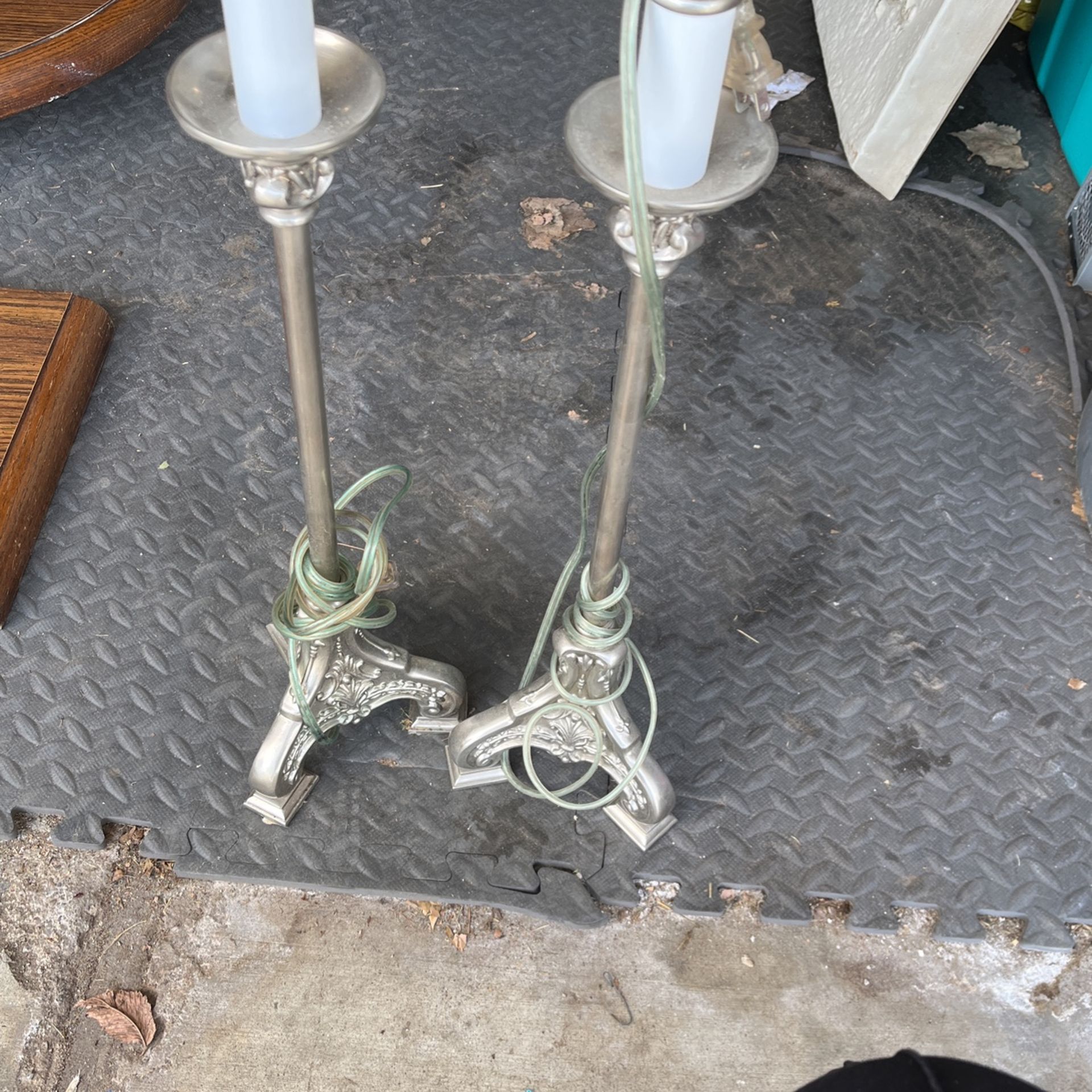 Two heavy metal table lamps