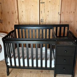 Crib with changing table