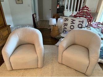 Swivel club chairs