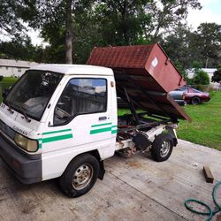 2 Cushman Truckster Cmc