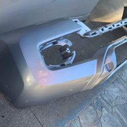 2016 - 2023 TOYOTA TACOMA FRONT BUMPER COVER SILVER GENUINE USED OEM. NCFF 