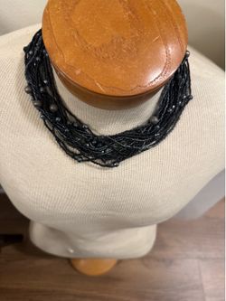 Multiple strand necklace with extension
