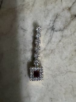 14k yellow gold ruby and diamond accent pendant