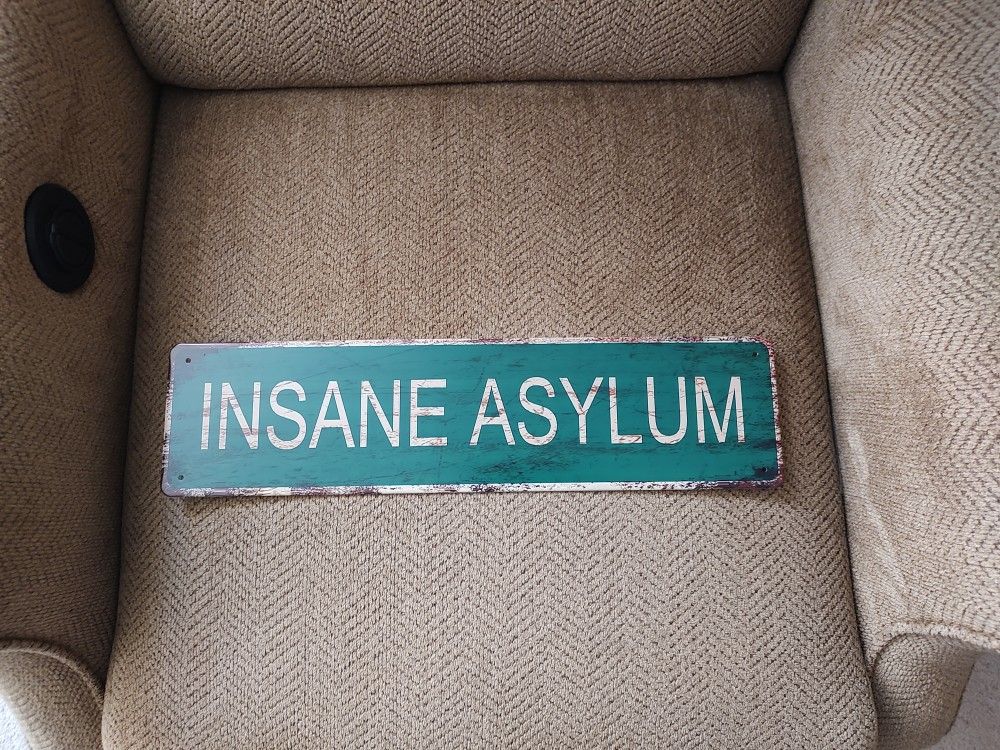 ASYLUM METAL SIGN. 4" X 16". NEW. PICKUP ONLY
