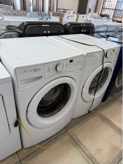 Whirlpool front load washer and gas dryer set