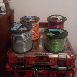 Three 500ft. rolls #10 awg stranded copper wire consisting of one grey,one orange and one red. Also have one 500ft reel of green #12awg stranded coppe