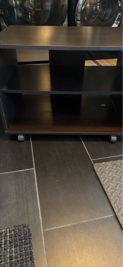 Dark brown small tv stand