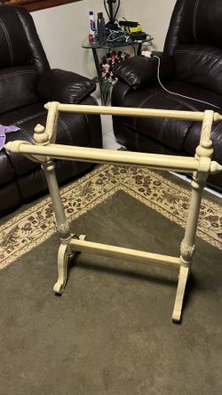 old antique wooden quilt rack