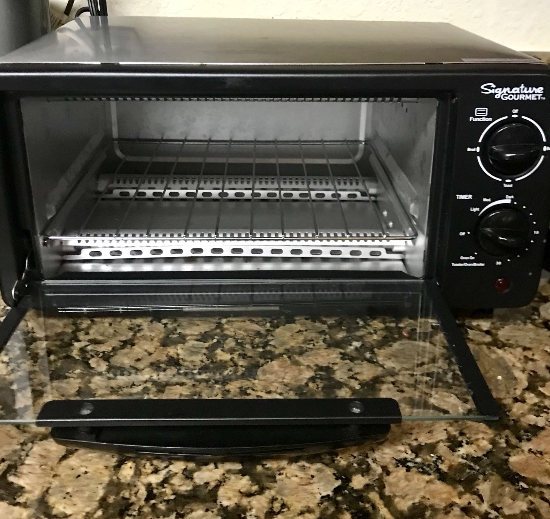 Signature Gourmet 4 Slice Toaster Oven. Horno pequeño.