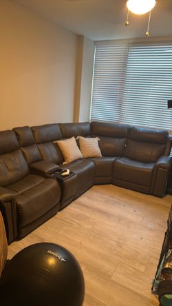 L couch for sale. Electric