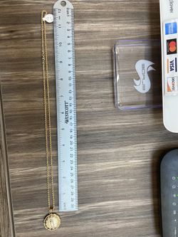 10k gold rope chain and double sided pendant combo for a good price!!