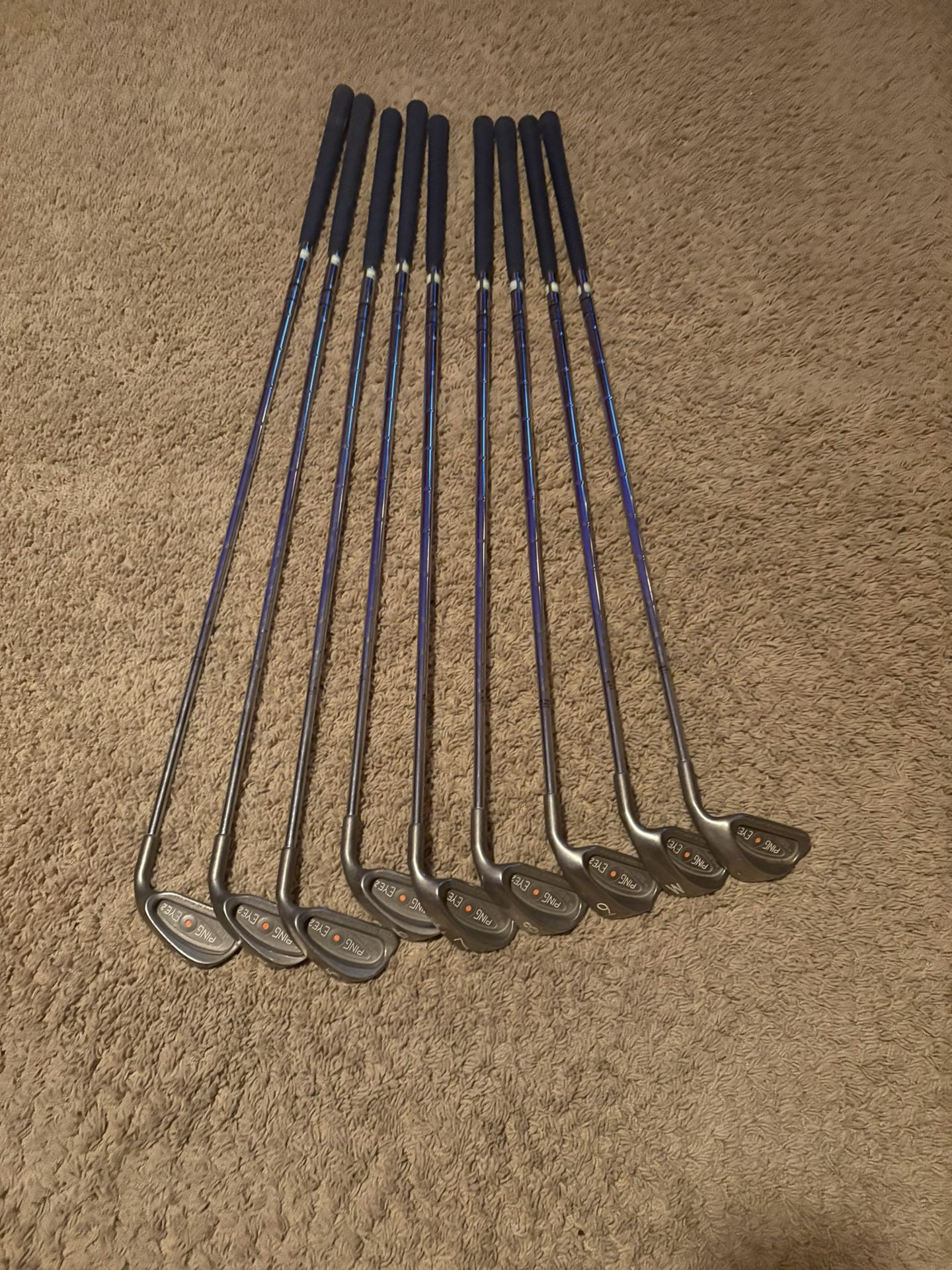 Ping golf clubs irons. Ping eye 2 orange Karsten 3-9, wedge and sand wedge.