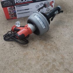 Ridge hand held drain cleaner with auto feed. Brand new in the box, limpiador de drenaje nuevo en caja