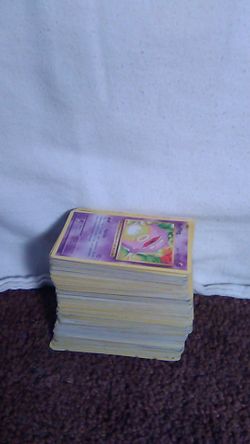 A huge stack of Pokemon cards