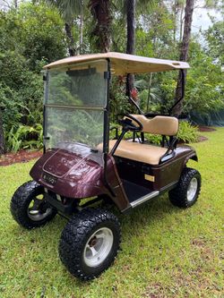 CUSTOM EZGO GOLF CART!! LIFTED RUNS AND DRIVES GREAT!!