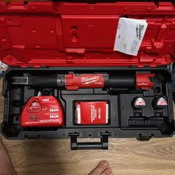 Milwaukee 3/8ths Electric Torque Wrench With Charger And Two Batteries