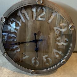 12 Inch Round Galvanized Metal Clock, Wood Background W/ Number Cut Out, Bolts, Aged Finish, Glass Face, Hanging Hook