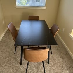 Rectangle Black Stone Dining Table With 4 Brown Faux Leather Chairs